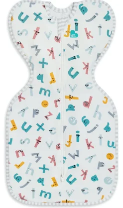 Love To Dream Swaddle UP Ecovero Moderate, Newborn - Alphabet Soup White